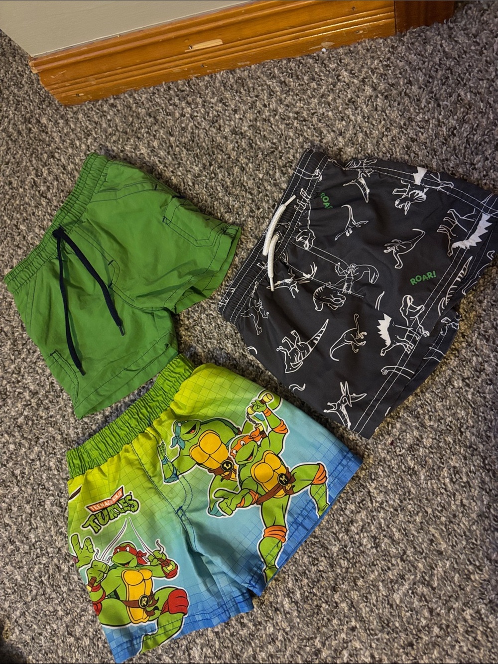 Three 12m swim trunks